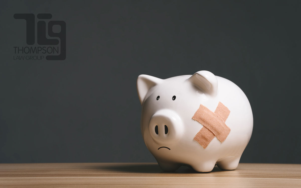 Bankruptcy; Pig Bank with Bandaids; Thompson Law Group
